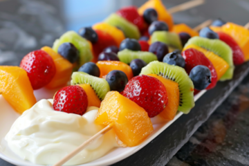 colorful fruit kabobs with cream cheese dip